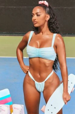 Ruched Micro Thong Bikini Bottoms In Blue 14 Ruched Micro Thong Bikini Bottoms In Blue -Modern Beach Bikini 2494 4 vacay pending blue ruched high waisted thong bikini bottoms bust flattering bikini top two piece swimwear 1