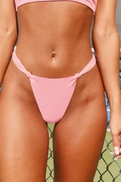Knot Thong Bikini Bottoms In Pink 17 Knot Thong Bikini Bottoms In Pink -Modern Beach Bikini 3011 6 endless summer pink one strap bikini top twisted strap bikini bottoms swimwear twopiece bikini 1