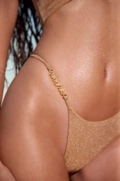 Asymmetric Thong Bikini Bottoms In Gold -Modern Beach Bikini NS0196 NS0186 6 Yazhi Gold Cross Strap Top Asymmetric Bikini Bottoms