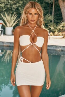 Asymmetric Cover Up Mini Skirt In Ivory 13 Asymmetric Cover Up Mini Skirt In Ivory -Modern Beach Bikini ns0018 1 sokhanya ivory asymetric tie detail mini skirt 1